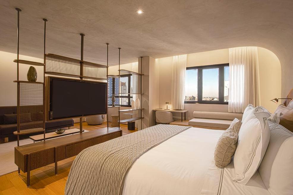 Qoya Hotel Curitiba, Curio Collection By Hilton Luaran gambar A room at the hotel