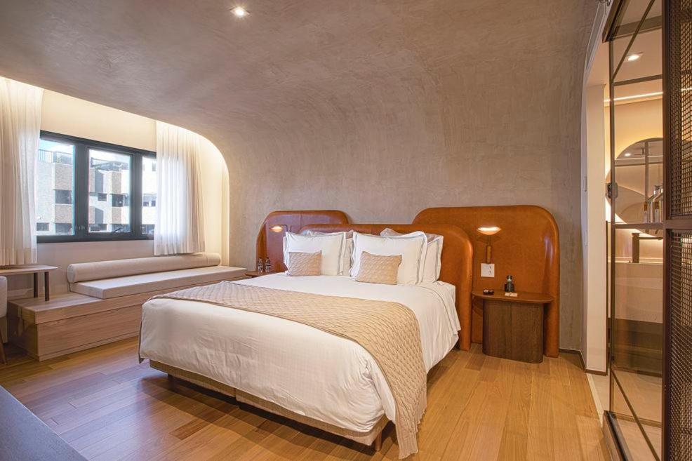 Qoya Hotel Curitiba, Curio Collection By Hilton Luaran gambar A bedroom at the hotel